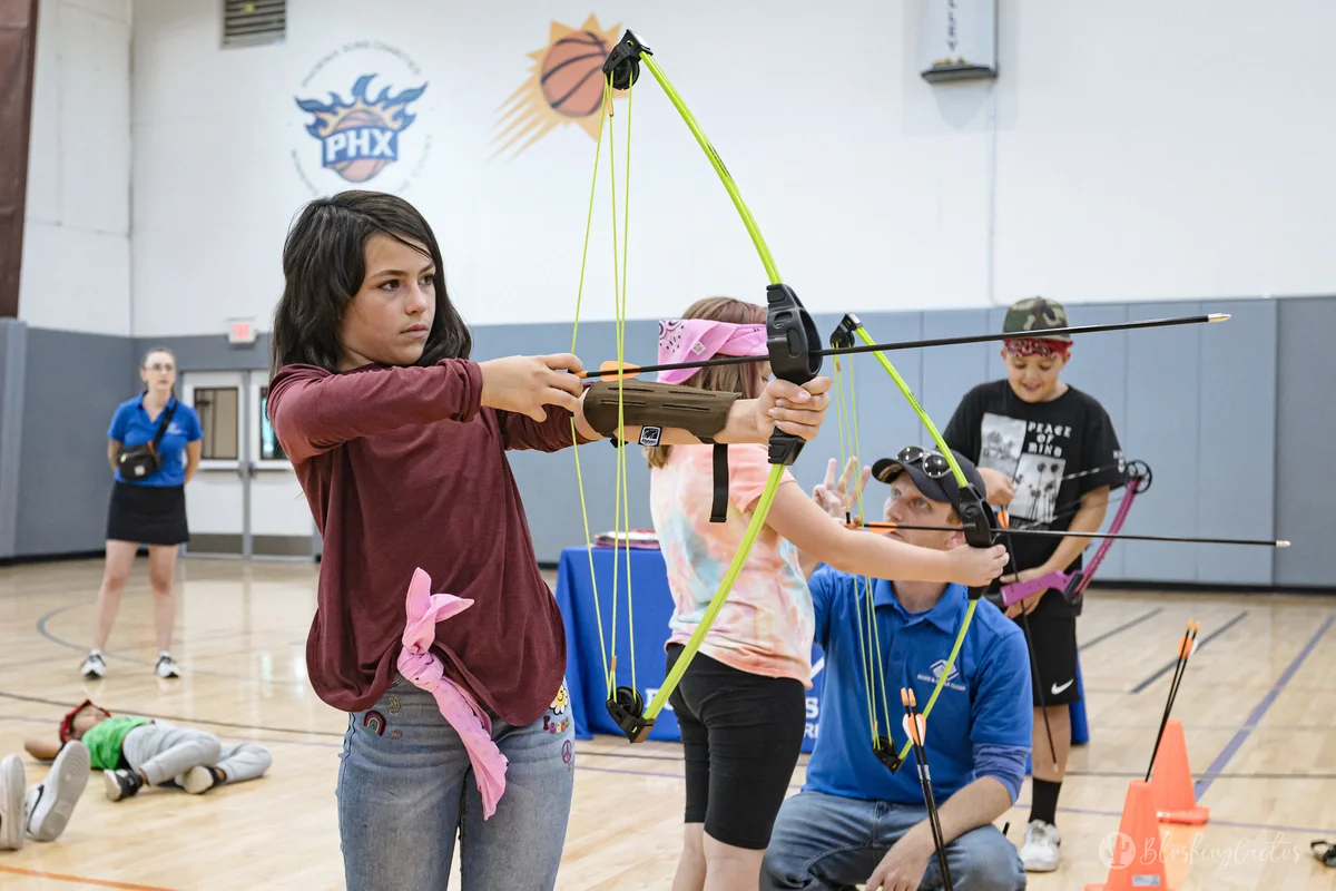 BGCCAZ club members dancing together during Dancer Day, smiling and having fun in a safe after-school program setting.